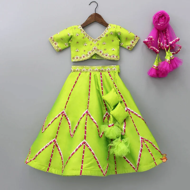 Pre Order: Green Embroidered Crop Top With Lehenga And Net Dupatta Silk Blend Satin Velvet