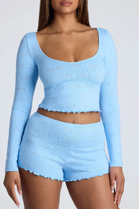 Long Sleeve Scoop Neck Pointelle Crop Top in Baby Blue Solid Print Embellished
