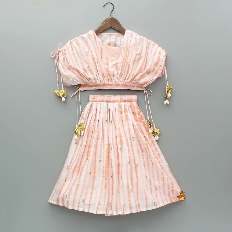 Pre Order: Peach Printed Embroidered Stylish Cape With Strappy Crop Top And Lehenga Handmade Hand-knitted Hand-woven
